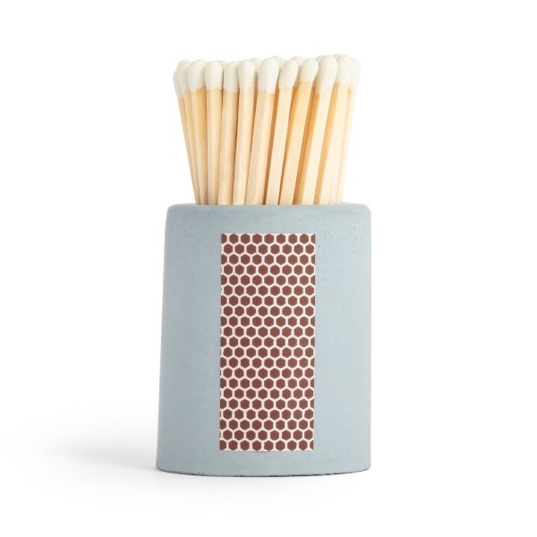 blue concrete vessel with matches