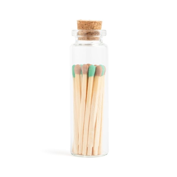 chocolate mint matchsticks in corked vial with match striker